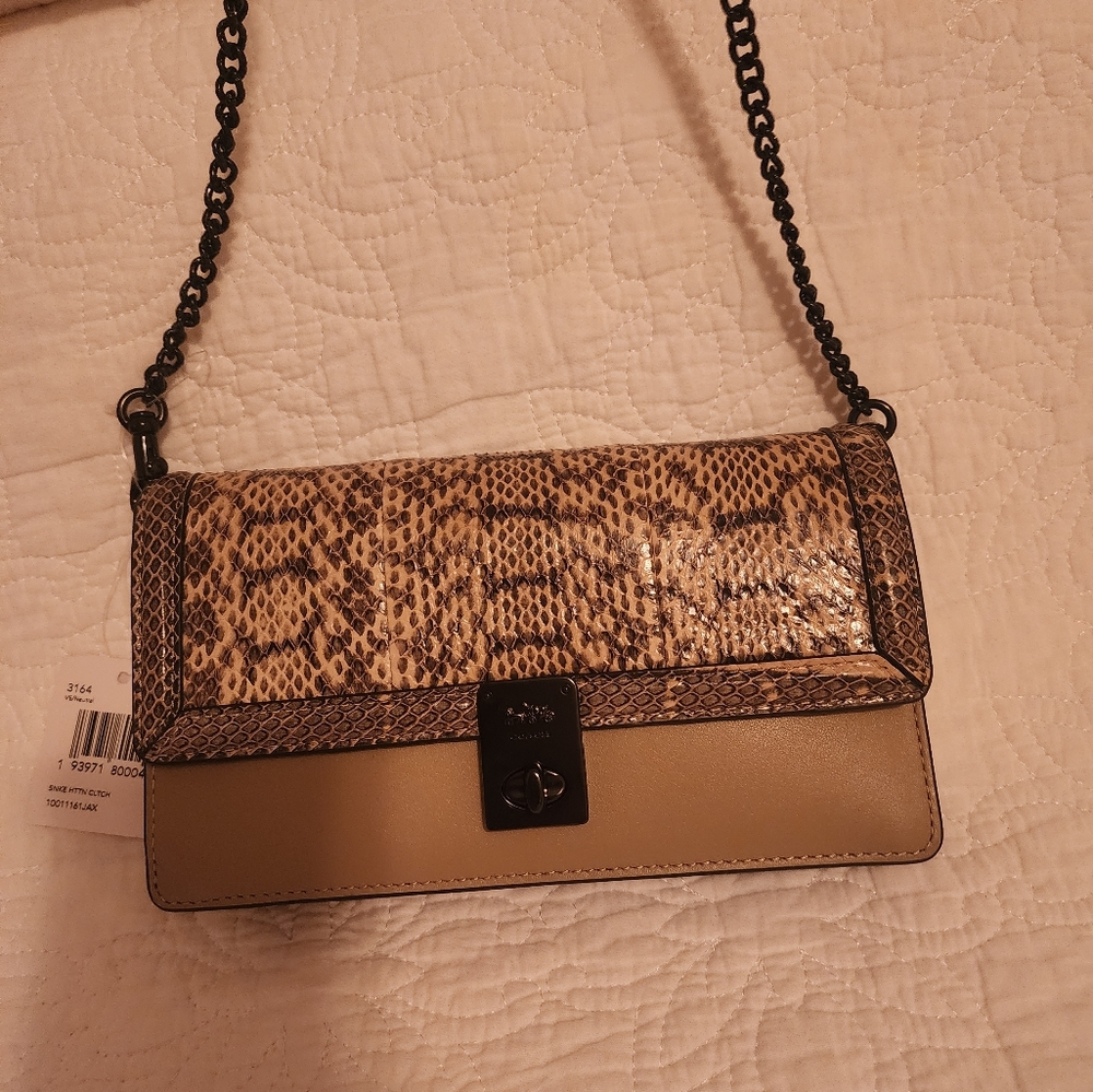 Brand new coach clutch/purse